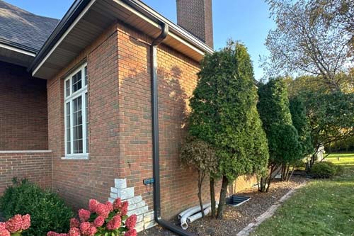 Gutter from edge of house.