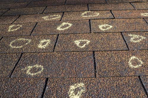 Hail Damaged Roof with circled dents